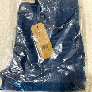 NWT still in plastic packaging. Levis 312 Shaping Slim jeans.  Womens 32x34